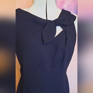 Stylish Cutout Black Sleeveless Dress with tie.